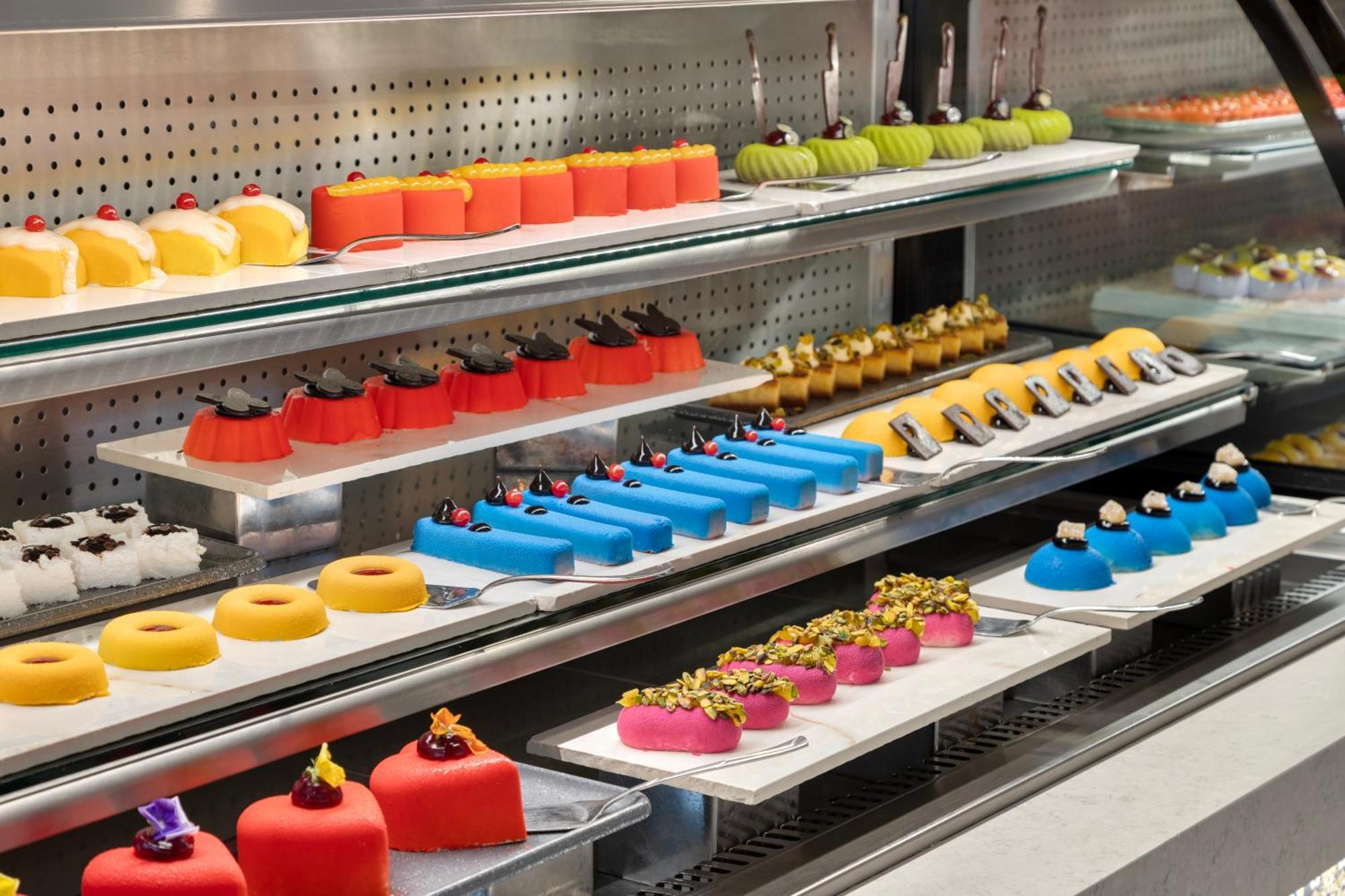 Ramada Plaza Antalya Hotel Bagian luar foto A display of petit fours