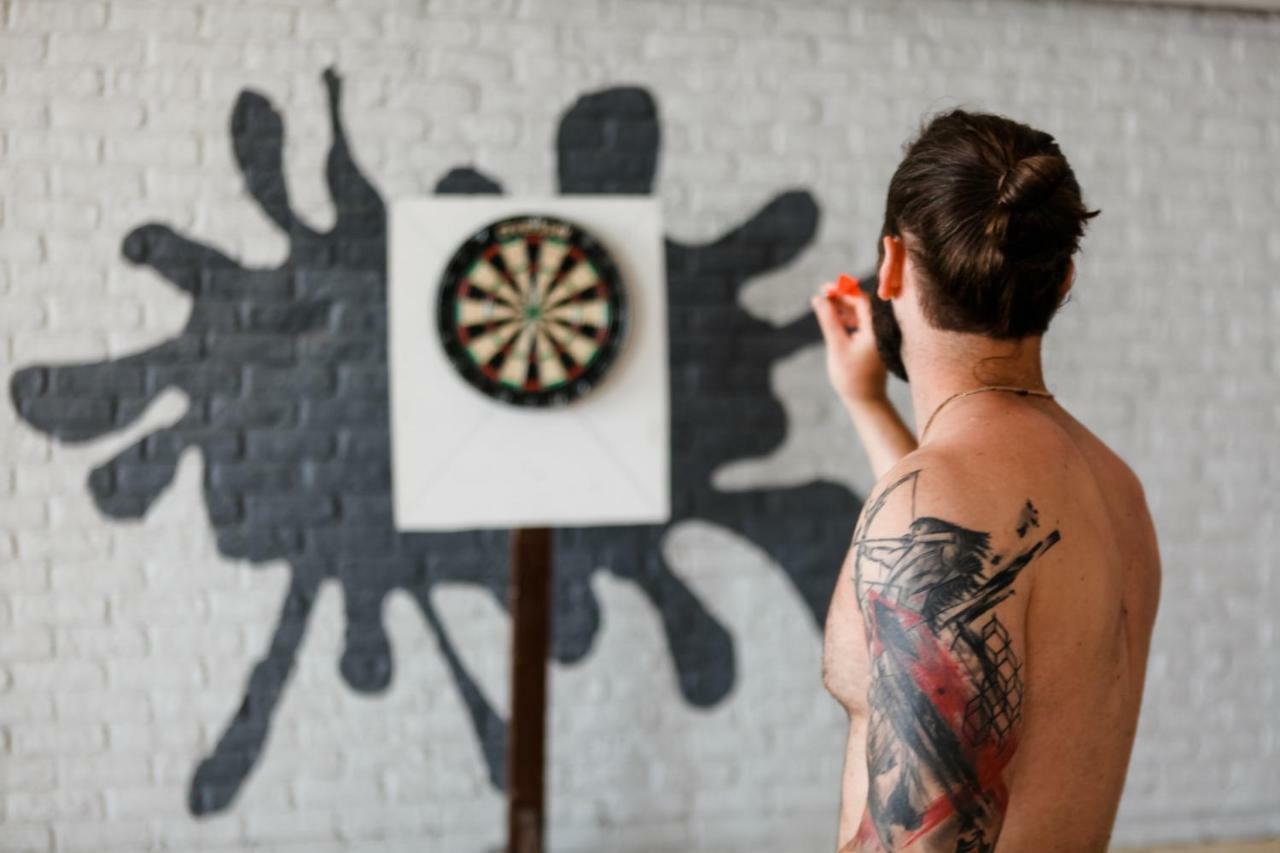 Ramada Plaza Antalya Hotel Bagian luar foto A player throwing a dart